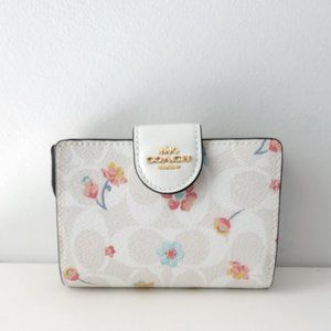 Gently used COACH Medium Corner Zip Wallet In Signature Canvas With Floral Print